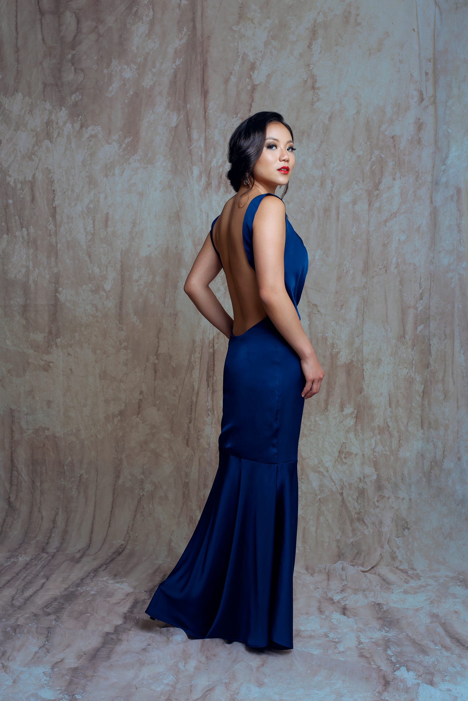 Sarah Chen wearing the Michelle Dress in midnight blue by Bastet Noir, photo by RaisaAzam, MUA: pearltji