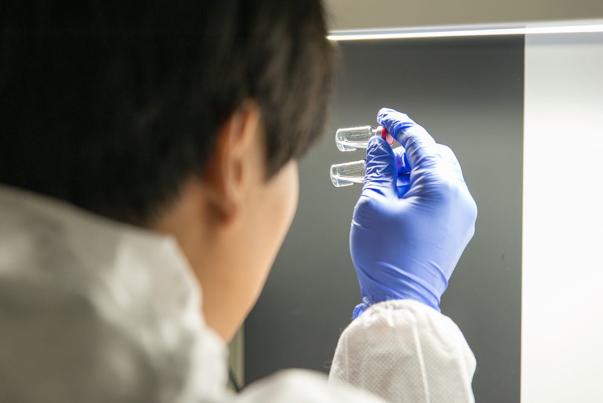 How did an Ebola vaccine go from lab to vials for its firstinuse