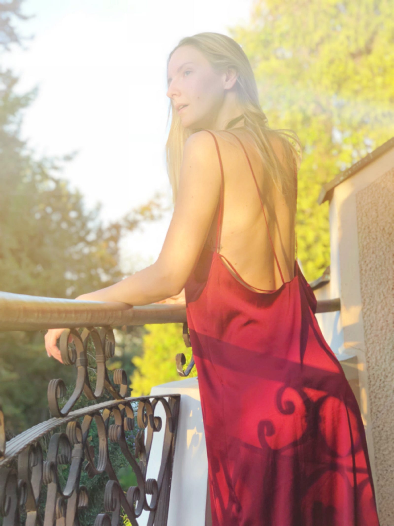 Angelina Blazheska wearing the burgundy slip on bareback dress