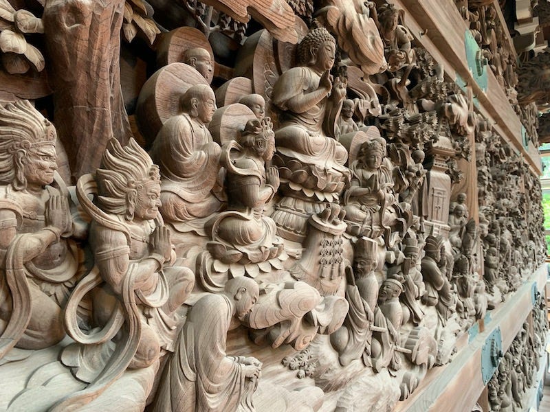 Ornate wooden carvings on the temple buildings of Tokyo’s Shibamata Taishakuten