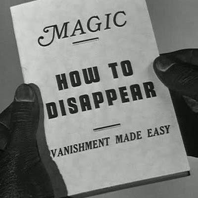 Hands holding a magic book that reads “How to disapear”