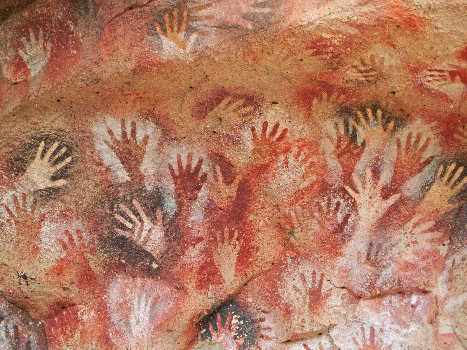 cave painting hands        
        <figure class=