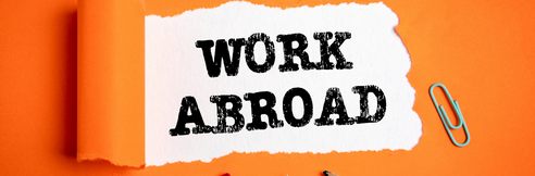 Words “Work Abroad” on a White and Orange background