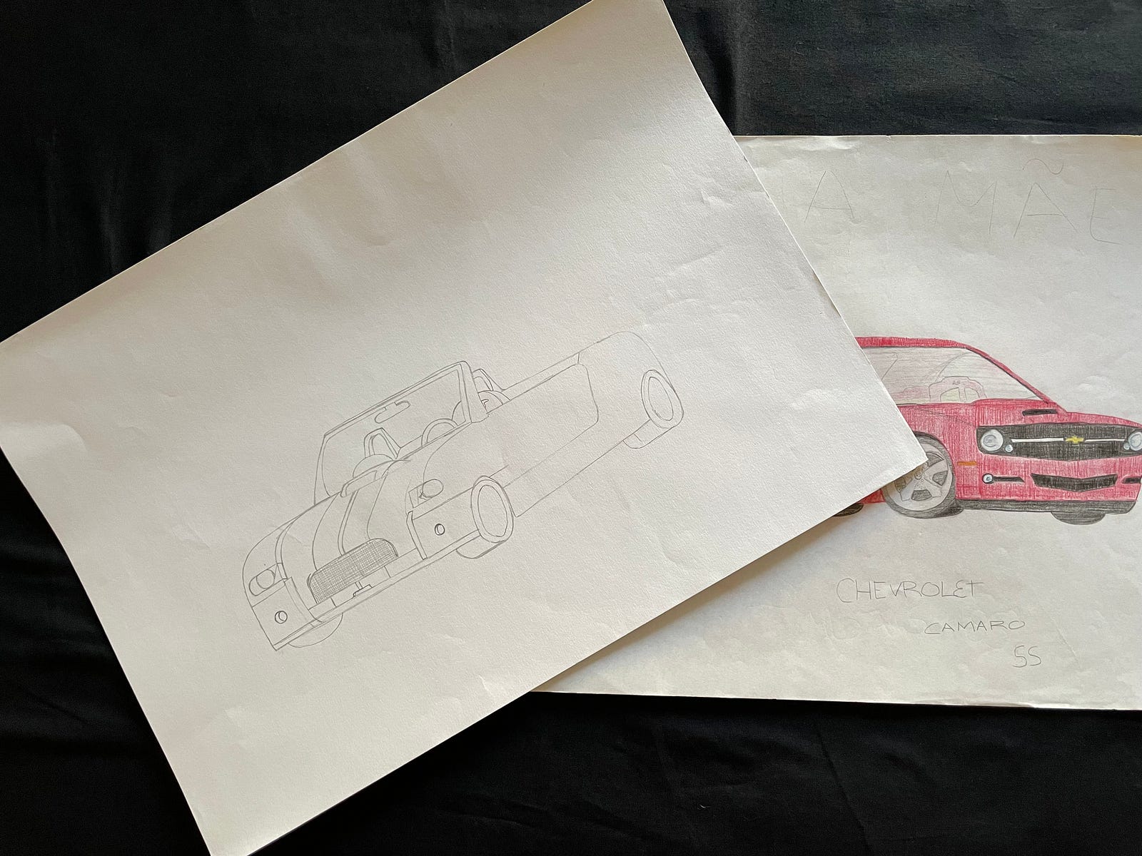 A picture of two cars I drew when I was a kid—one of them for my mother