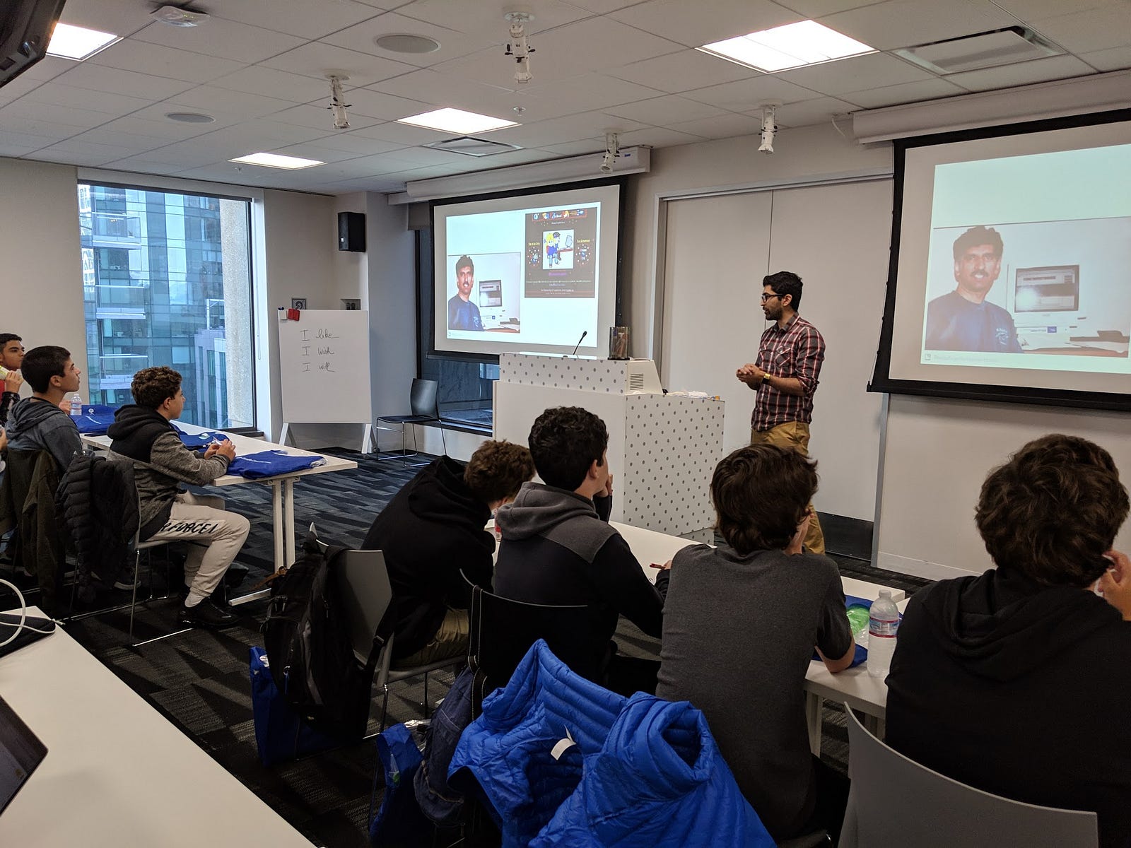 Sandeep Dinesh, developer advocate at Google, explaining to students about Google Cloud and everyday artificial intelligence