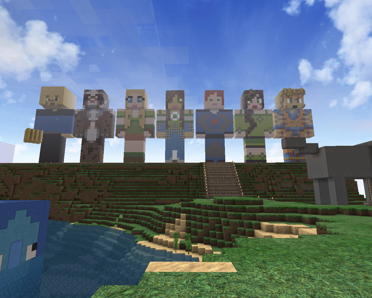 Large statues of Minecraft characters stand on a hill in the game Minecraft.