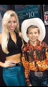 Peighton Tubre posing next to Mason Ramsey