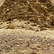 A tight crop of a pyramid that looks like a pile of bricks.