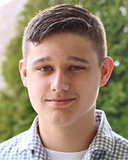 A headshot of Grant Ayers.