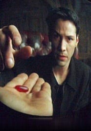 Neo in the film The Matrix choosing the blue pill or the red one.
