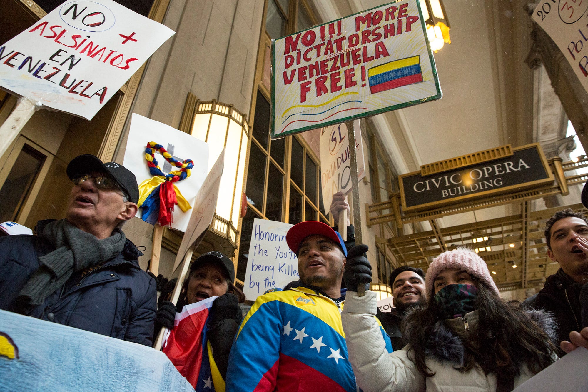 Demonstrators Brought Flags And Handmade Signs To Yesterdays Rally Outside Of The The Consulate General Of Venezuela In Downtown Chicago To Show Their Demonstrators Brought Flags And Handmade Signs To Yesterdays Rally Outside Of The The Consulate General Of Venezuela In Downtown Chicago To Show Their