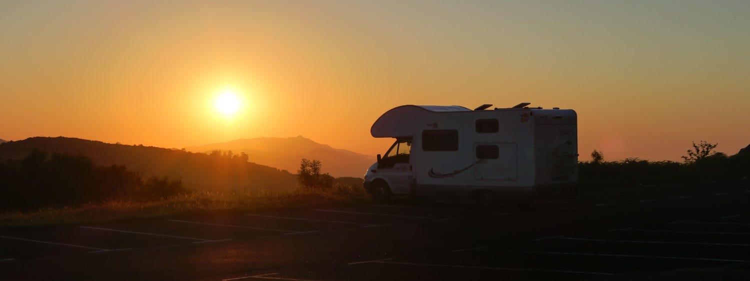 Digital Nomad Backpackers Upsize to RV; Drive Around Spain For The Summer