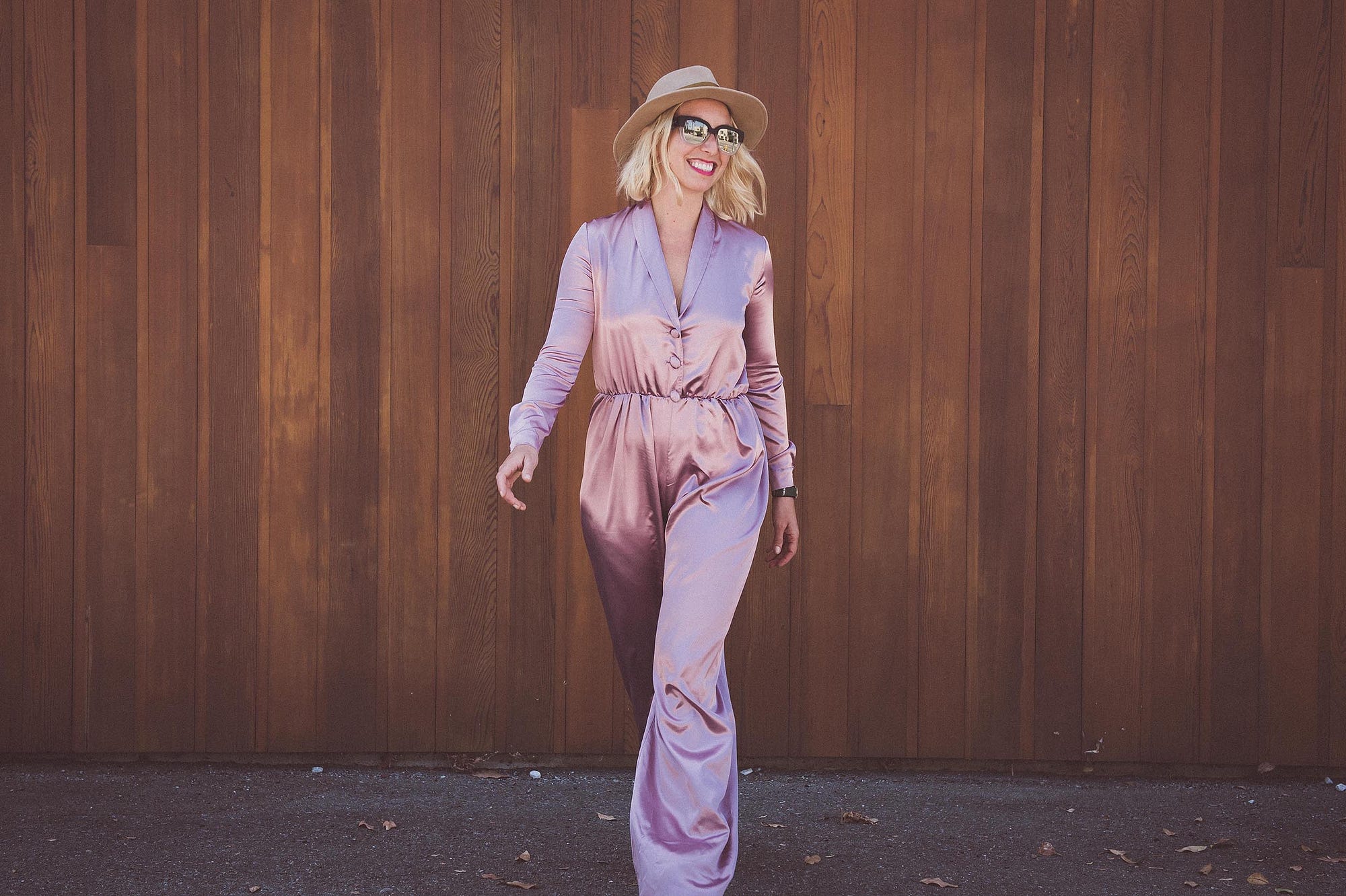 Natasha Case, the founder of Coolhaus wearing the dusty pink jumpsuit by Bastet Noir