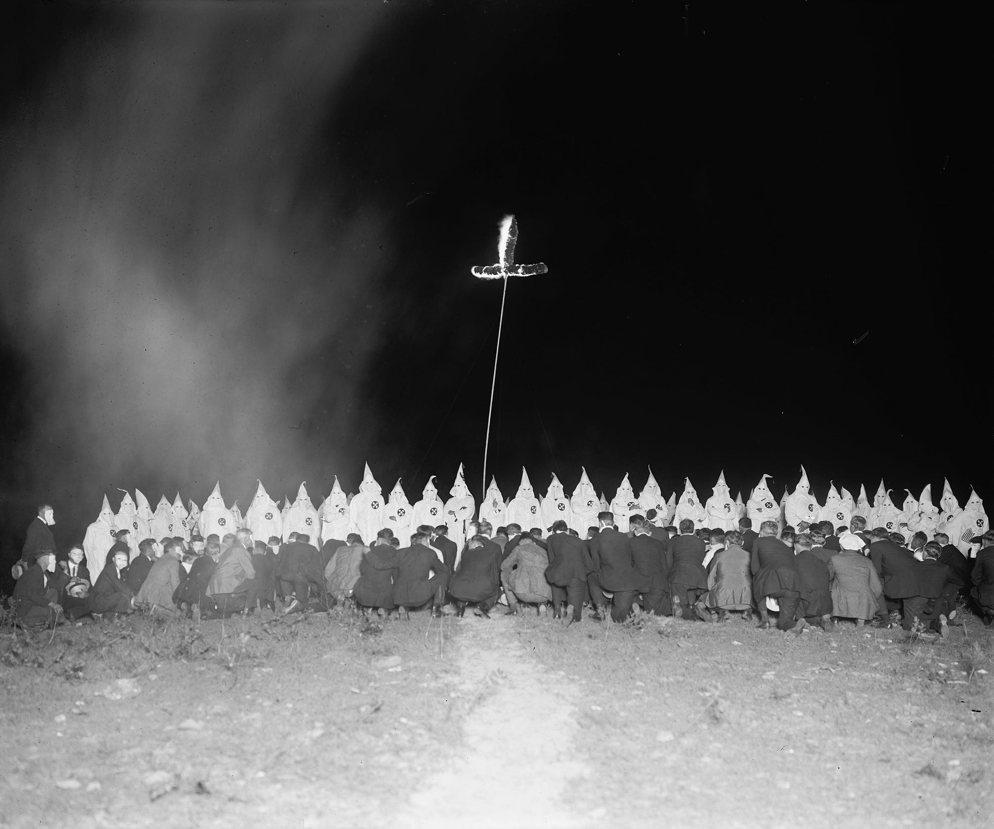 Why does the Ku Klux Klan burn crosses? They got the idea from a movie.