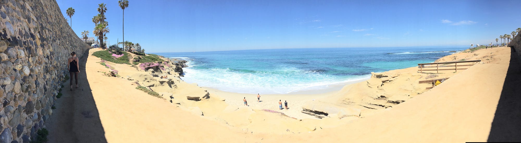 I M Always Like This Disability Stories Medium Image Description A Panoramic Picture Of Beach In San Go It Is Beautiful Day Person Walking Along The Path Using Their Cane