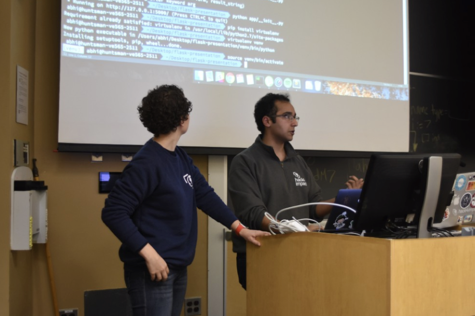 Veronica Wharton and Abhinav Suri teaching a workshop on Python web development