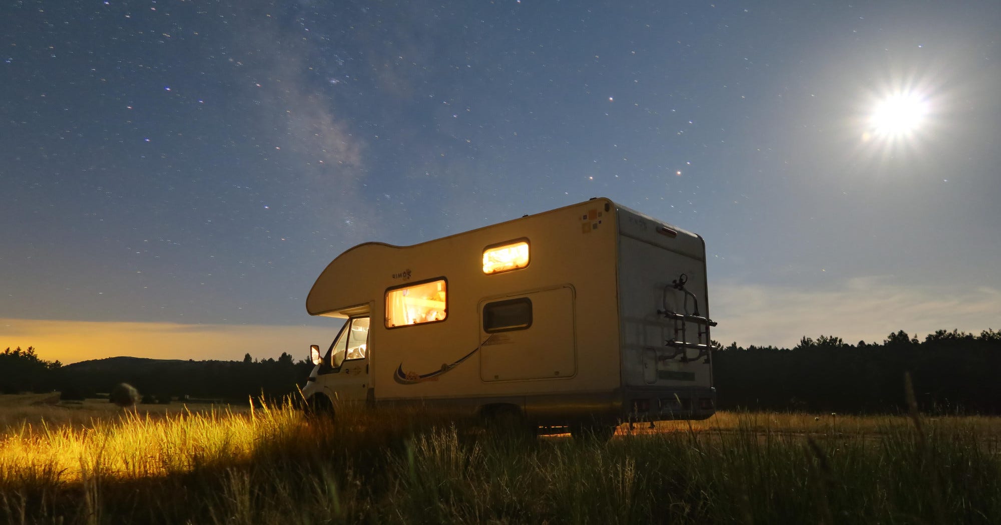 Digital Nomad Backpackers Upsize to RV; Drive Around Spain For The Summer