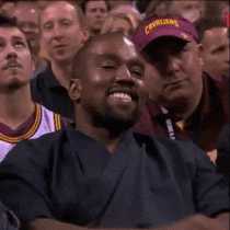 Kanye West (or Ye) smiling and then suddenly serious and nodding