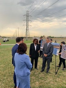 Secretary Buttigieg talks with local leaders about the new infrastructure project in Fontana.