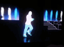 GIF of man dancing on a neon stage