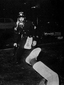 Policeman approaching unidentified student, February 13, 1969 (Duke University Archives).