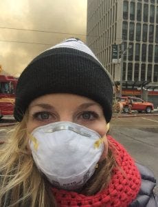 wildfire smoke mask being worn by woman