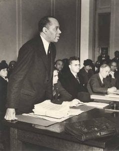 Charles Hamilton Houston speaks at an unidentified government hearing in Washington, D.C. circa 1940.