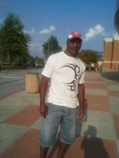 Evander Holyfield Wearing Mike Tyson Shirt