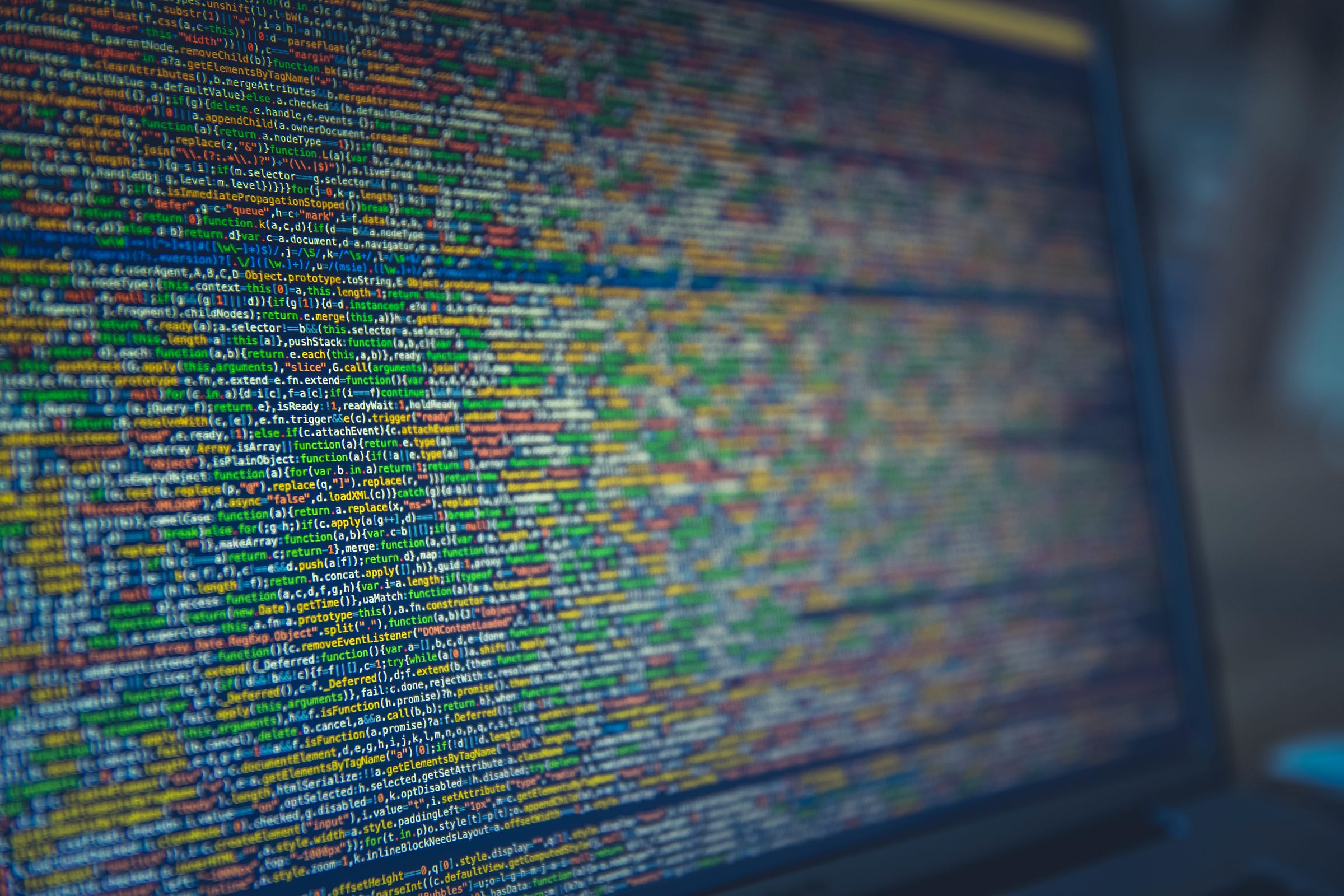 “Long colorful lines of code on a puter screen” by Markus Spiske on Unsplash