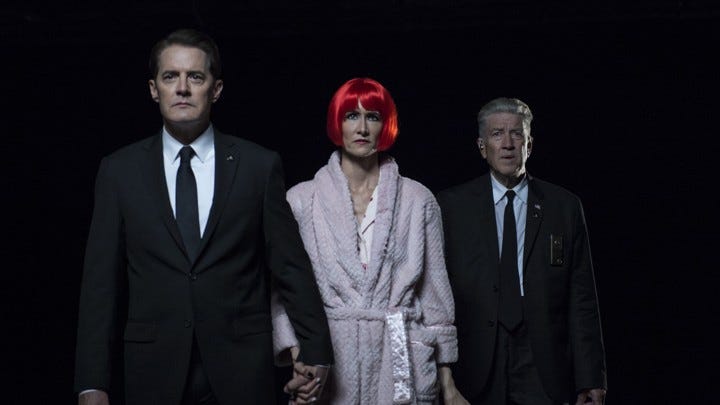 Agent Dale Cooper, Diane, and Gordon Cole in dark passage