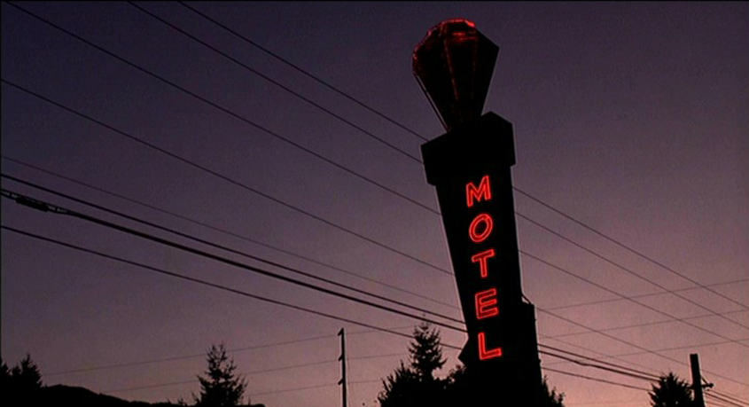 Motel exterior neon signage