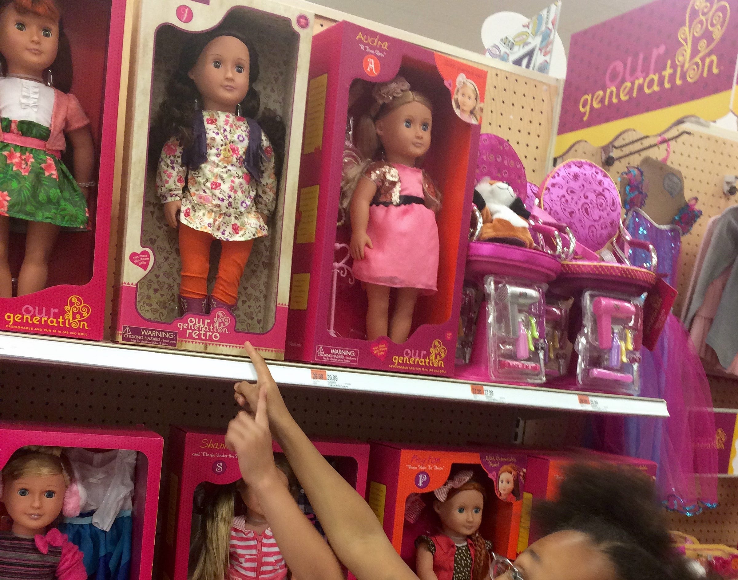 Why are all the white dolls sitting together on the Target shelf?