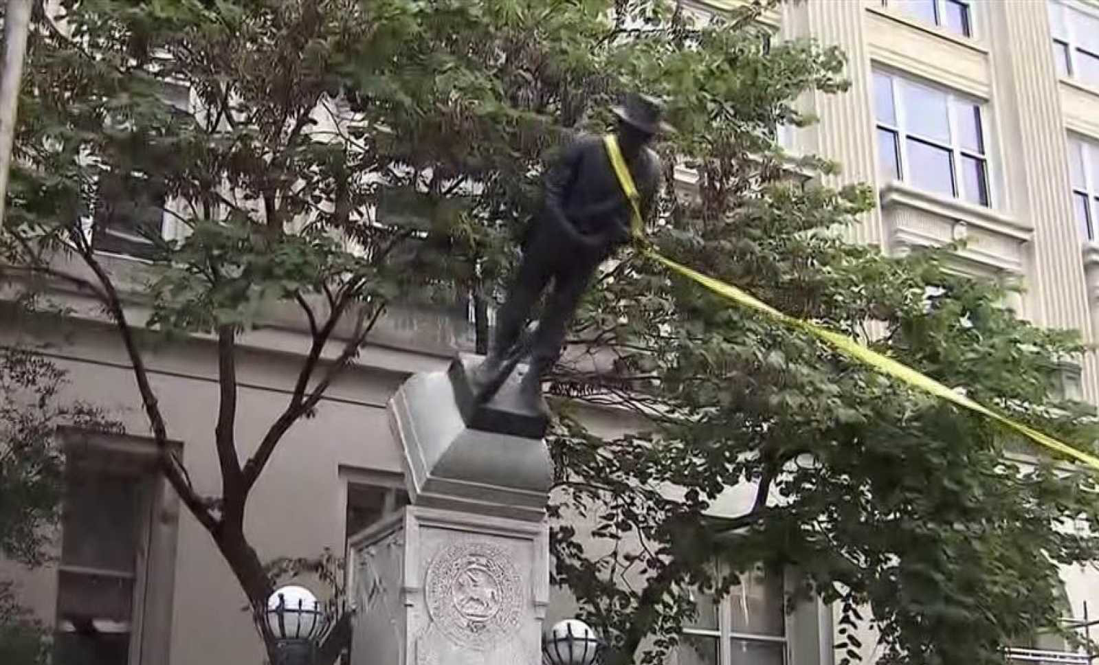 Image result for tearing down civil war statues