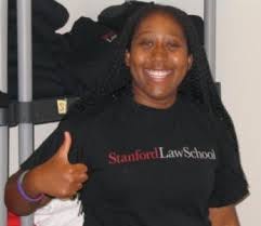 Tamika giving a thumbs up in a stanford law black tshirt