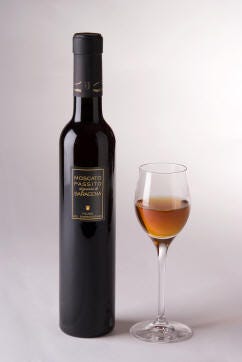 A bottle of Feudo dei Sandervino, Vino Moscato di Saracena. With a glass of the dessert wine.