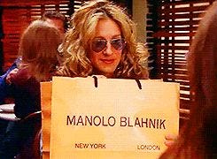 Carrie Bradshaw from Sex & the City with Manolo Blahnik shopping bag