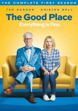 the cover of the TV show- The Good Place. Two main characters sit on the couch.