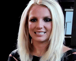Gif of Britney Spears smiling awkwardly.