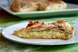 Gibanica, a popular warm appetizer, is traditionally made from cheese and egg whites. 