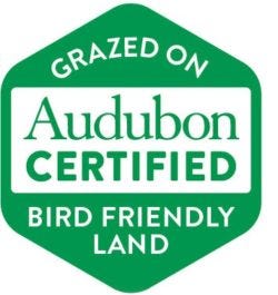 A green label that says “Grazed on bird-friendly land” and “Audubon Certified”