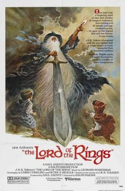 Theatrical release poster for Ralph Bakshi’s Lord of the Rings. Gandalf holds a sword in front of two hobbits.