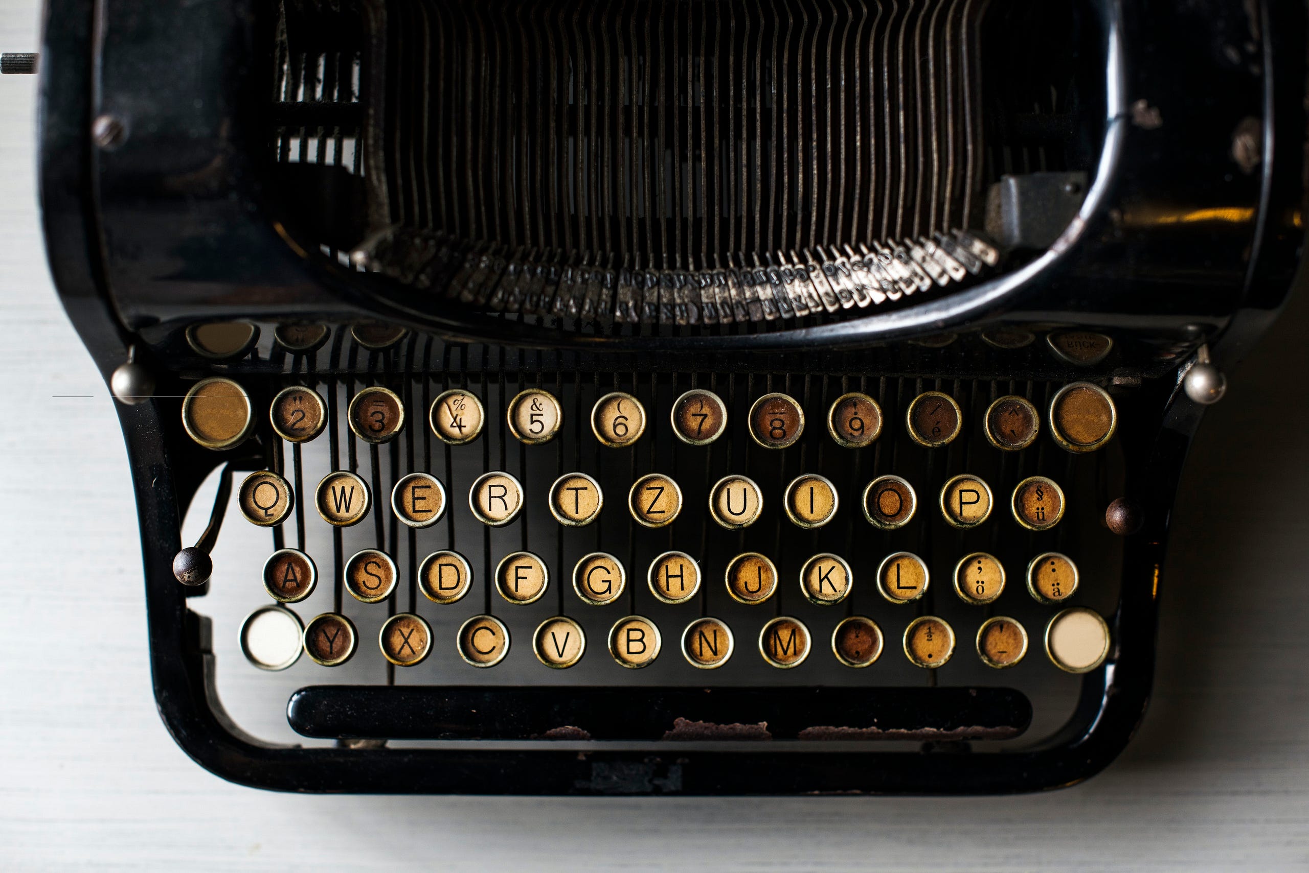 Photo: [Teddy Rawpixel](https://www.rawpixel.com/user/15024) via [Rawpixel](https://www.rawpixel.com/image/100189/free-photo-image-write-typewriter-fashion)An antique black typewriter with aged yellow keys.
