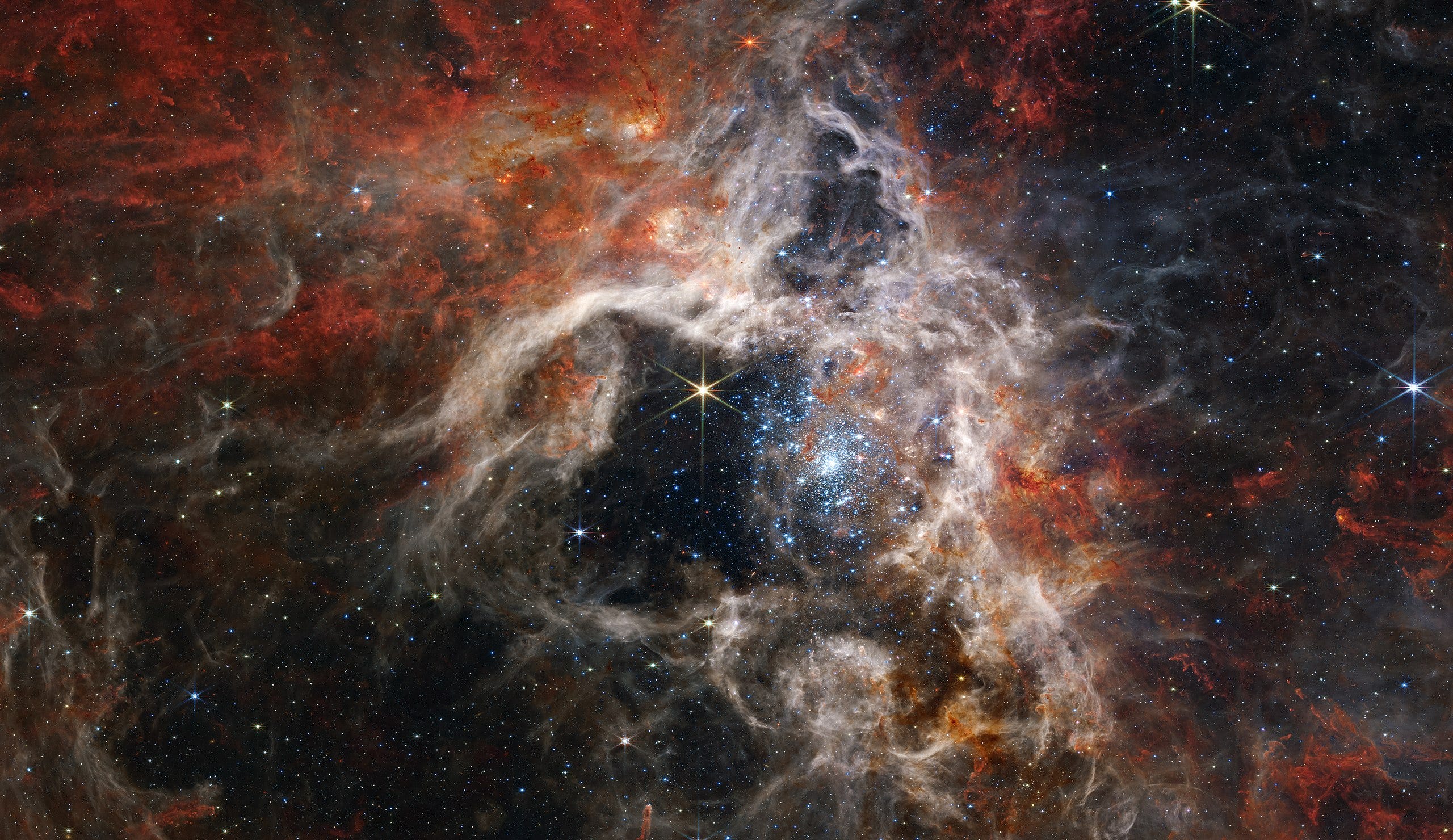 An invisible black hole has been found in the Tarantula nebula