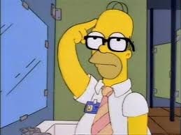 Homero Simpson pensando con lentes