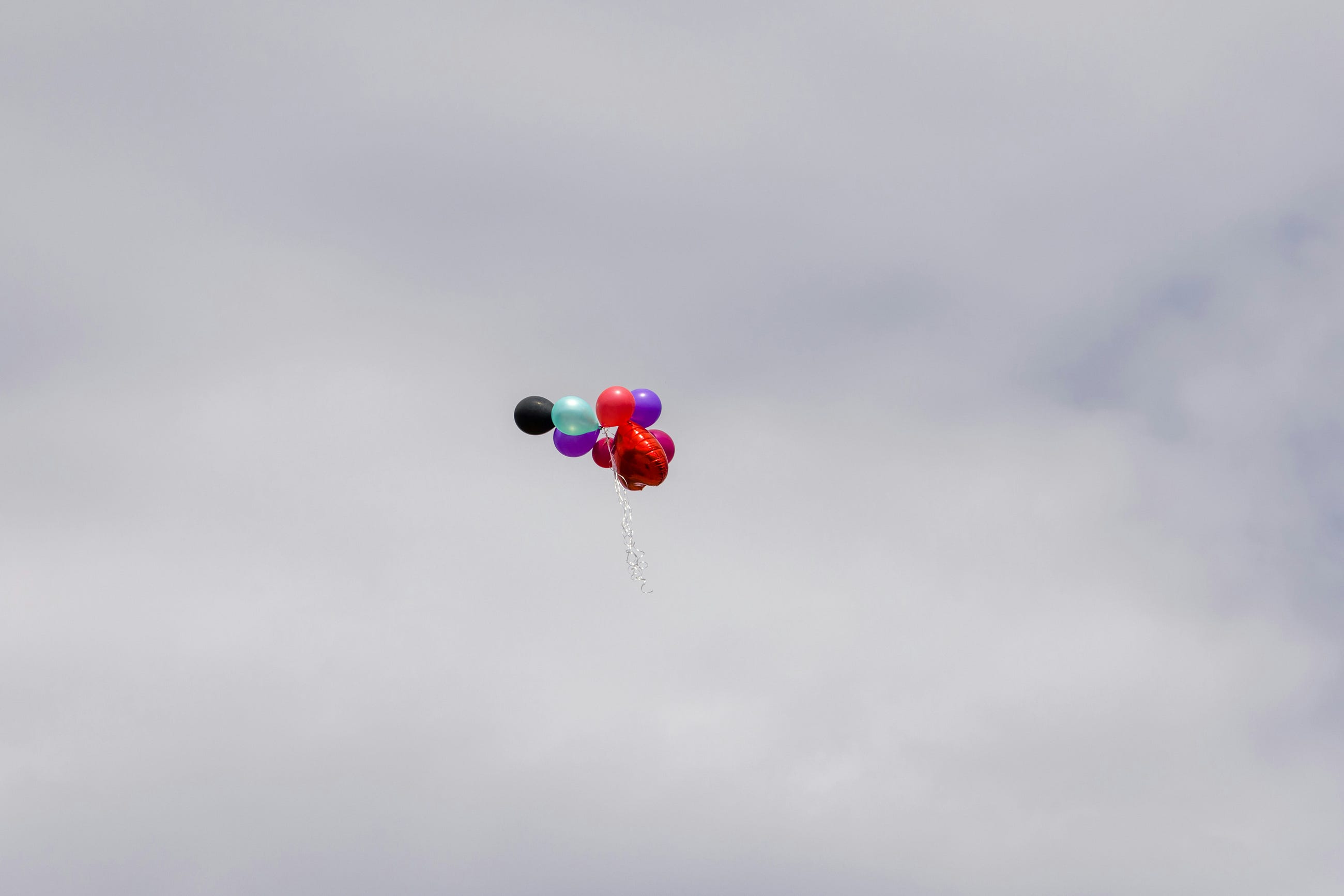 How Many Balloons Does It Take to Lift a Rusty Brain-