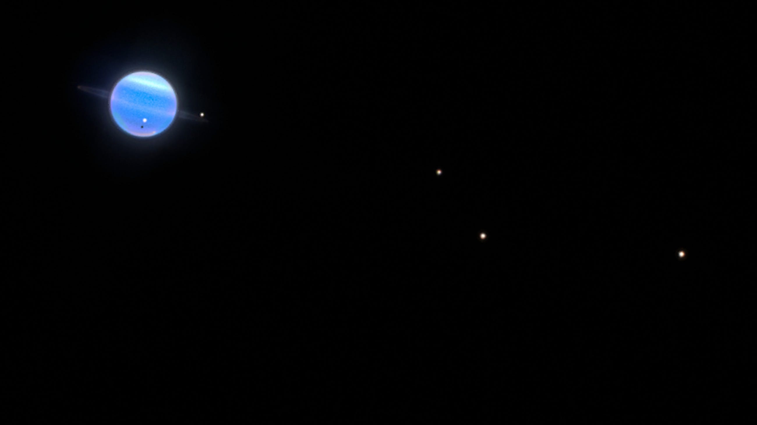 Uranus’s moons are darkened on one side Hubble reveals