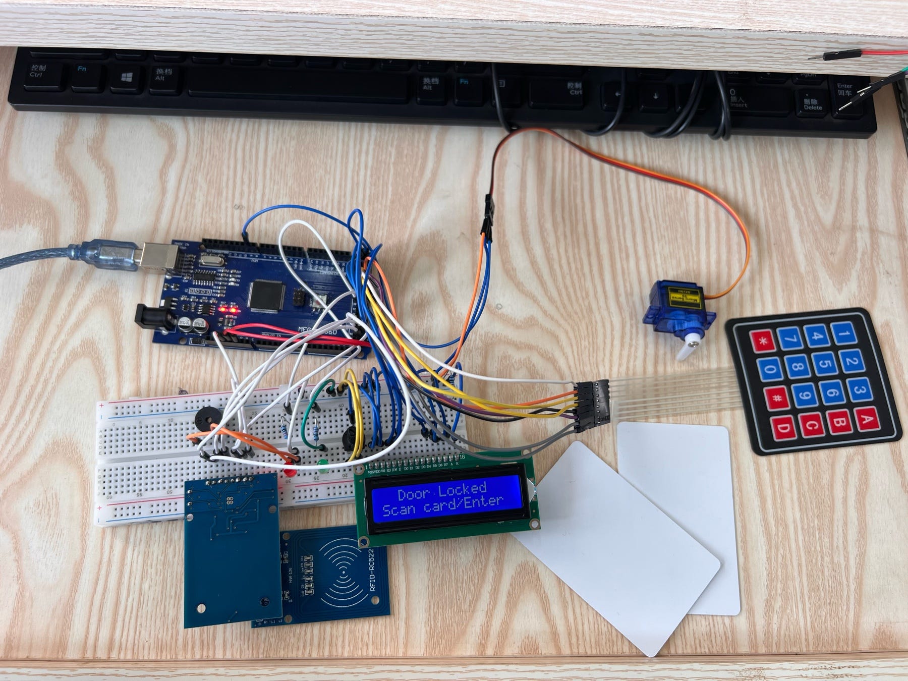 Building a Dual-Authentication Smart Door Lock: RFID, Keypad, and Arduino Integration