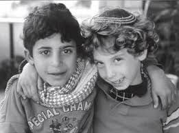 Palestinian Muslim child and Israeli Jewish child embracing