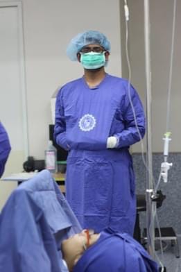 Man in hospital scrubs in Operating Theater