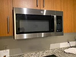 The best installed GE externally vented microwave.